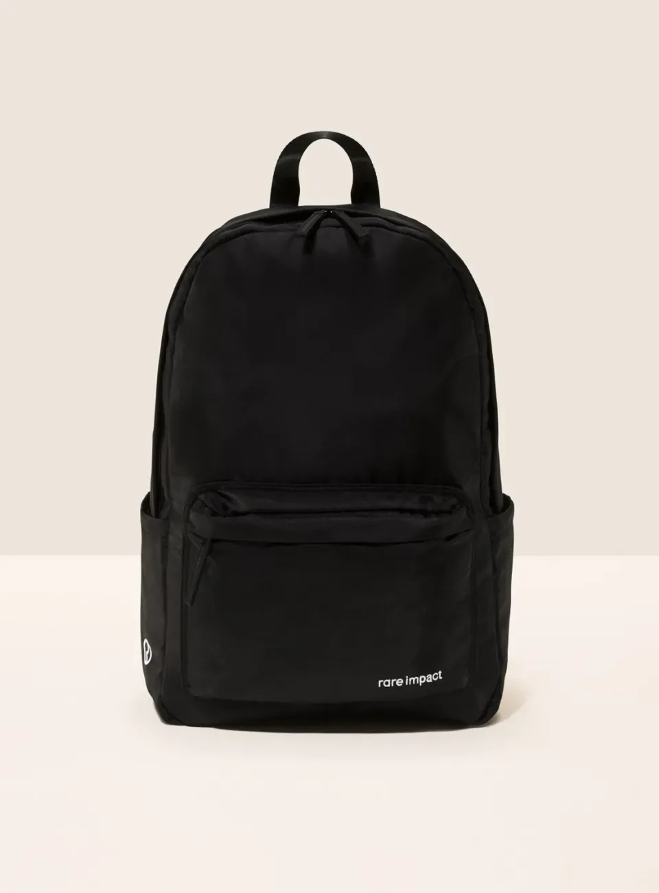 Rare Beauty Rare Impact sac à dos nylon noir minimaliste